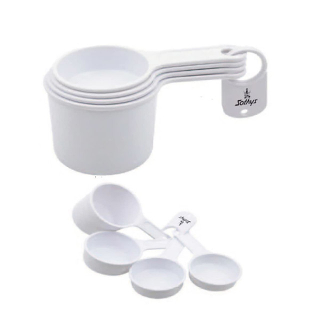 A set of white measuring scoops in various sizes, featuring a handle and a logo on one piece.