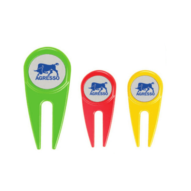 Three golf tees in green, red, and yellow, each featuring a logo on the top.