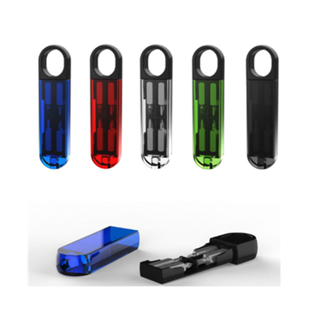 A collection of five brightly coloured tool sets in blue, red, green, and black, with a transparent casing displaying the tools inside.