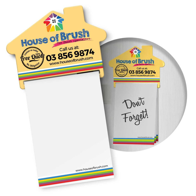 A magnetic memo pad in the shape of a house, featuring colourful accents and a branding logo at the top.
