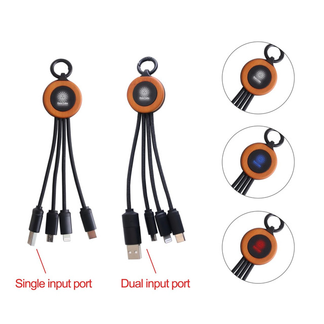 A round light-up charging cable in orange and black, featuring single and dual input ports with a logo.