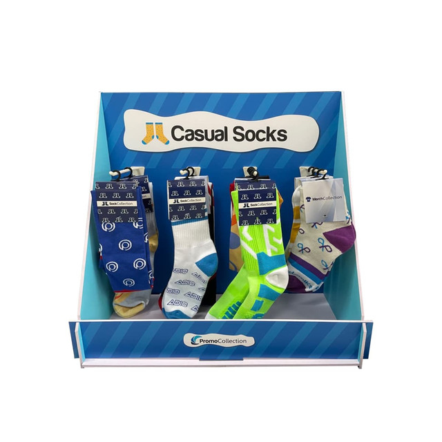 A display box featuring various colourful custom socks arranged in sections, with a branded logo on the box.