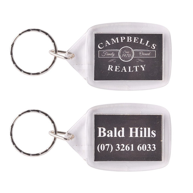 A rectangular acrylic keyring with a silver keychain, featuring a logo on one side and contact details on the other.