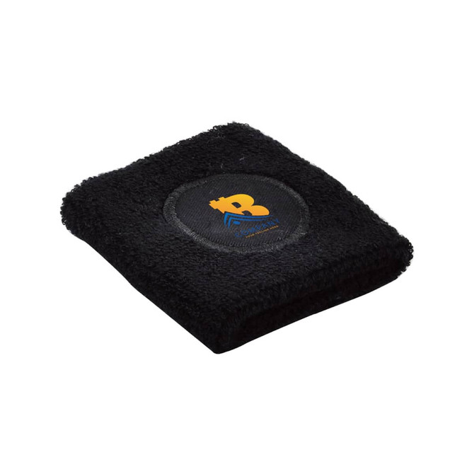 A black Terry Sport Wristband featuring a circular logo in the centre. Soft and made of terry fabric.
