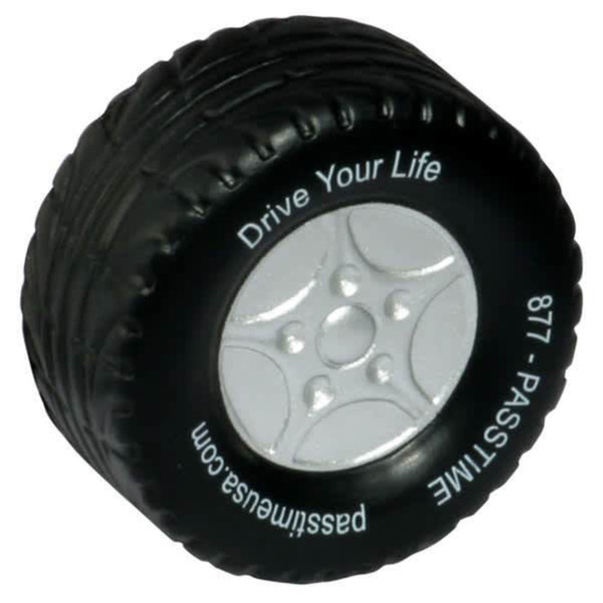 A black tire-shaped stress reliever with a silver wheel design and a logo on the side.