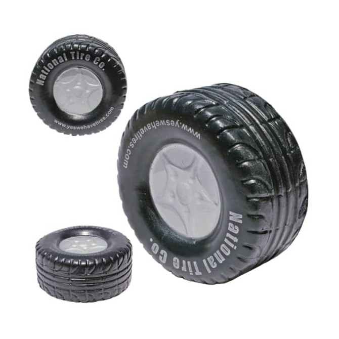 A black tire-shaped stress reliever with a grey centre, featuring a logo on the side.