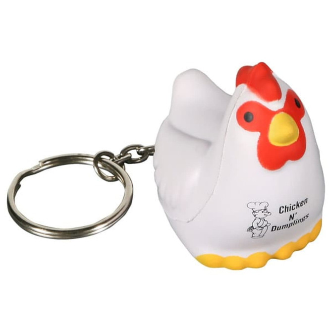 A keyring shaped like a white rooster stress reliever, featuring a yellow base and a small logo.