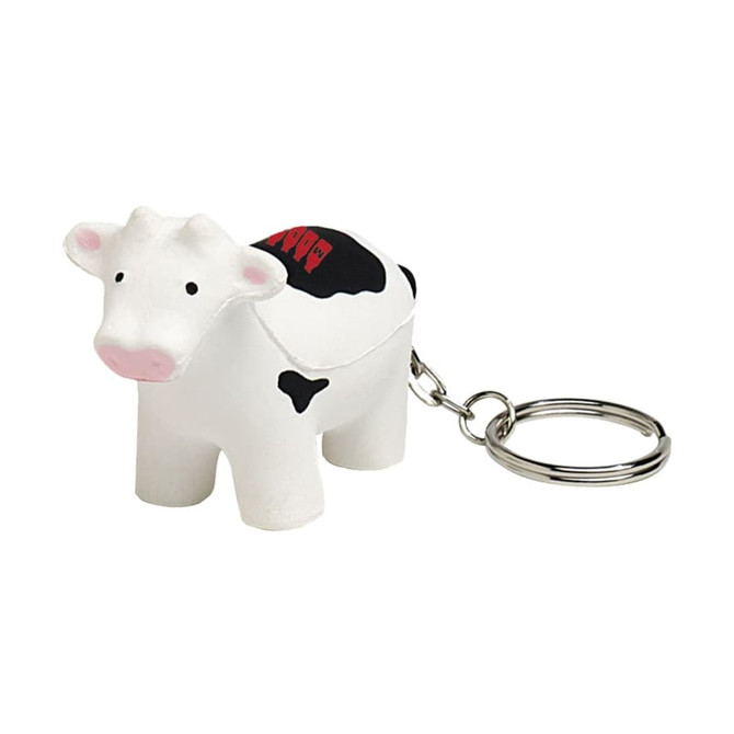 A cow-shaped stress reliever in white and black, attached to a metal keyring.