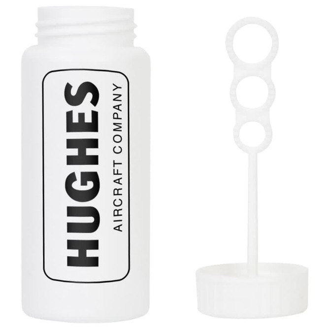 A white bottle with a logo, accompanied by a bubble wand featuring three circular loops.