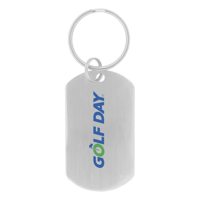 A silver dog tag keychain featuring a logo, attached to a metal ring.