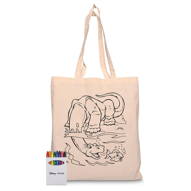 A calico tote bag featuring a line drawing of an elephant by water, accompanied by a set of coloured crayons.