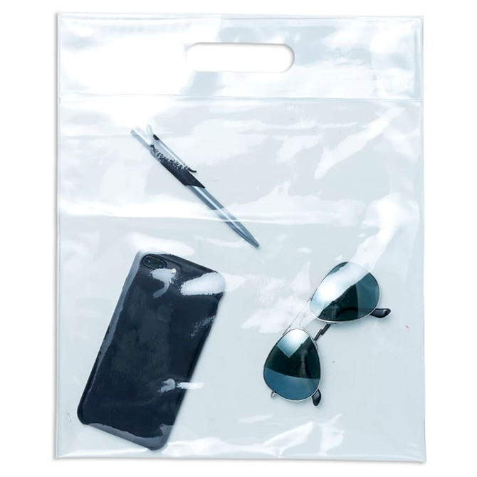 A clear tote bag containing a pen, sunglasses, and a mobile phone. The bag has a handle and a sleek design.