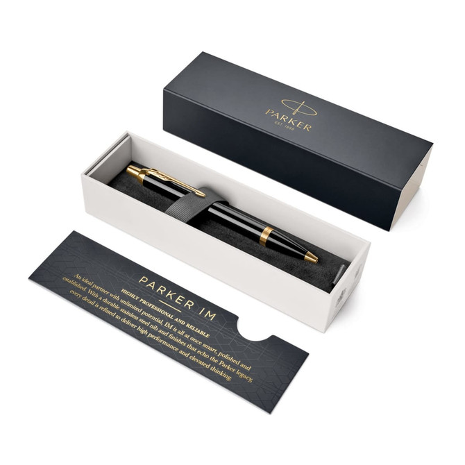 A black lacquer ballpoint pen presented in a sleek box with gold trim and a protective insert.