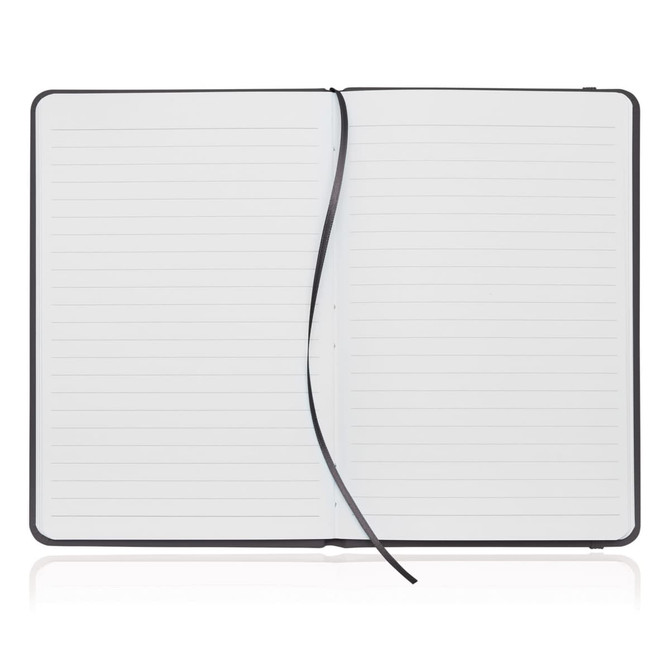 A black A5 notebook journal with a leather-look cover, featuring lined pages and a ribbon bookmark.