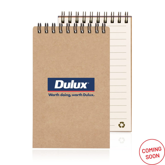A recycled paper notepad with a spiral binding, featuring a brown cover and lined pages, along with a logo.