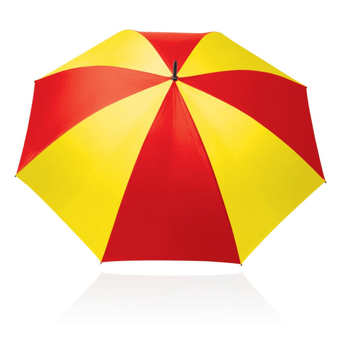 A striped umbrella featuring a red and yellow design, with a black handle and a central opening mechanism.