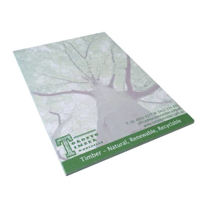 A6 writing pad featuring a tree design, in green and white, with a logo. It contains 50 leaves.