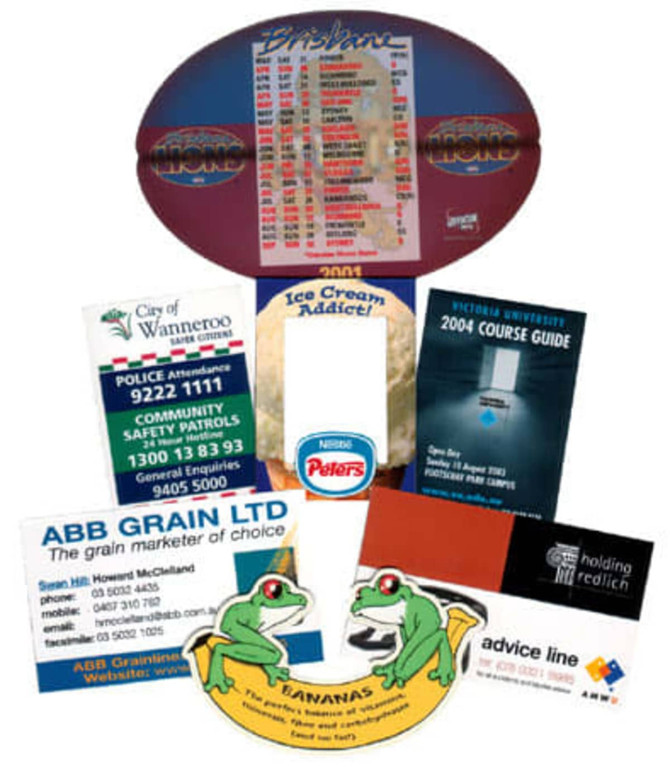 A collection of promotional fridge magnets featuring various designs, colours, and branding from different organisations.