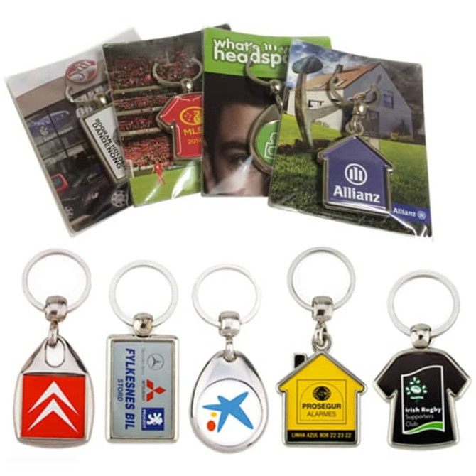 A collection of metal key rings on backing cards, featuring various designs and colours, packaged in poly bags.