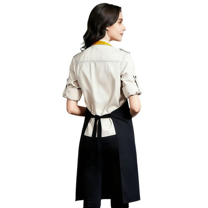 A poly-cotton canvas full bib apron in black with a colourful neck strap, featuring a design logo on the back.