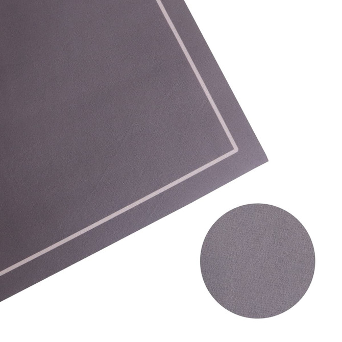 A grey diatomite floor mat featuring a subtle border design and a circular inset showing the texture.
