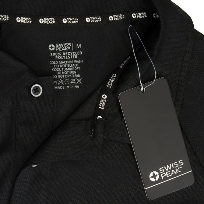 A black unisex polo shirt with care instructions and a tag, featuring a logo.