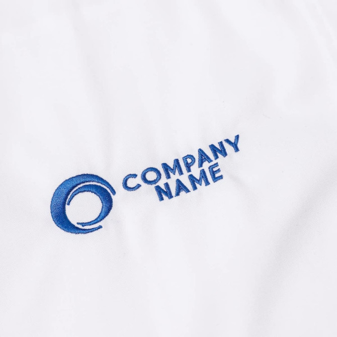 A white chef jacket featuring short sleeves and a single-breasted design with a blue logo.