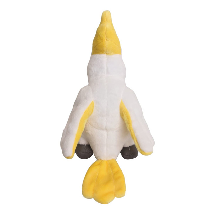 A plush cockatoo toy in white and yellow, with a soft texture and detailed tail. Features a branding logo.