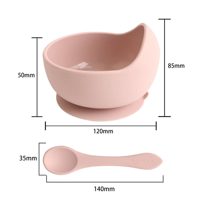 A pink silicone suction bowl with a curved design and a matching spoon, featuring dimensions indicated.