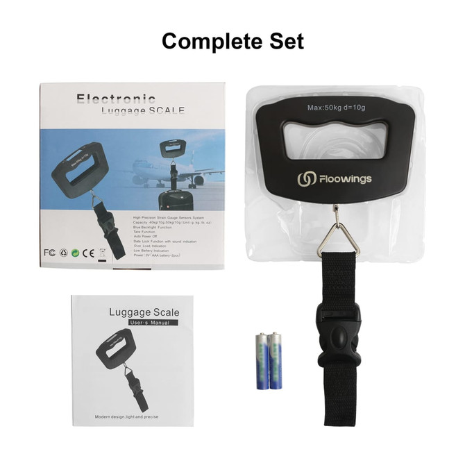 A black electronic luggage scale with a carrying strap, batteries, and a user manual, presented in a complete set.