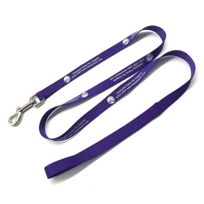 A purple dog leash with a silver clip and a logo, featuring printed text along its length.