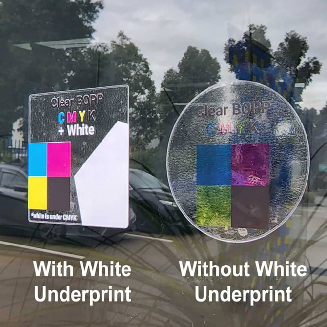 Two clear vinyl stickers displayed on a window, showcasing colour samples with and without a white underprint.