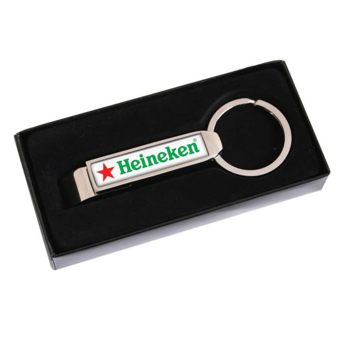 A drink bottle opener in silver with a circular keyring and a branded logo, presented in a black box.