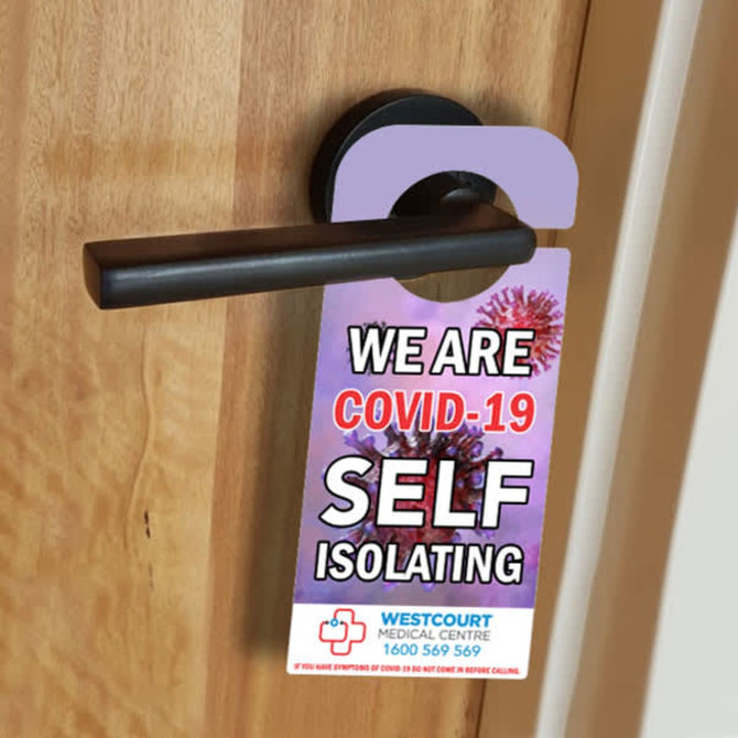 A door hanger in vibrant colours featuring a logo, designed to indicate self-isolation due to COVID-19.