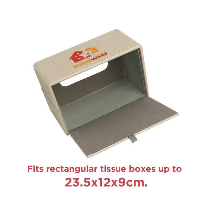 A large rectangular tissue box in a beige colour with a built-in handle and an interior lining. It has branding on the exterior.