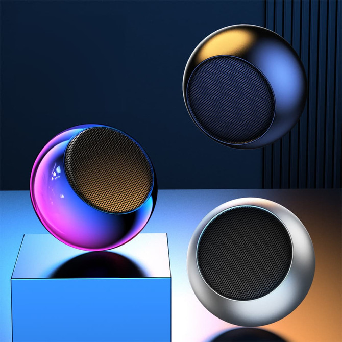 Three mini bass wireless speakers in vibrant colours, featuring a sleek, round design with a mesh speaker grill.