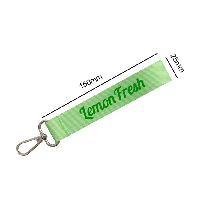 A green sublimation keyring with a metal clasp, featuring a logo printed on the strap. Measurements included.