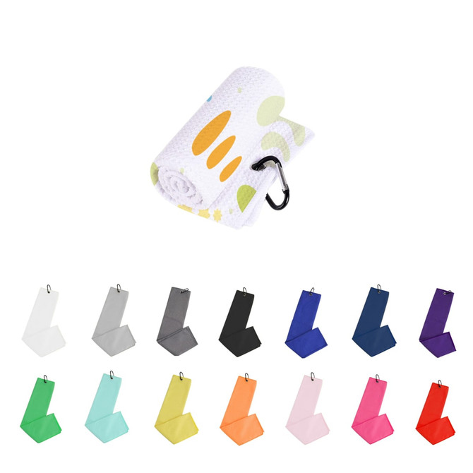 A rolled waffle golf towel featuring a carabiner clip, available in various colours including green, pink, and orange.