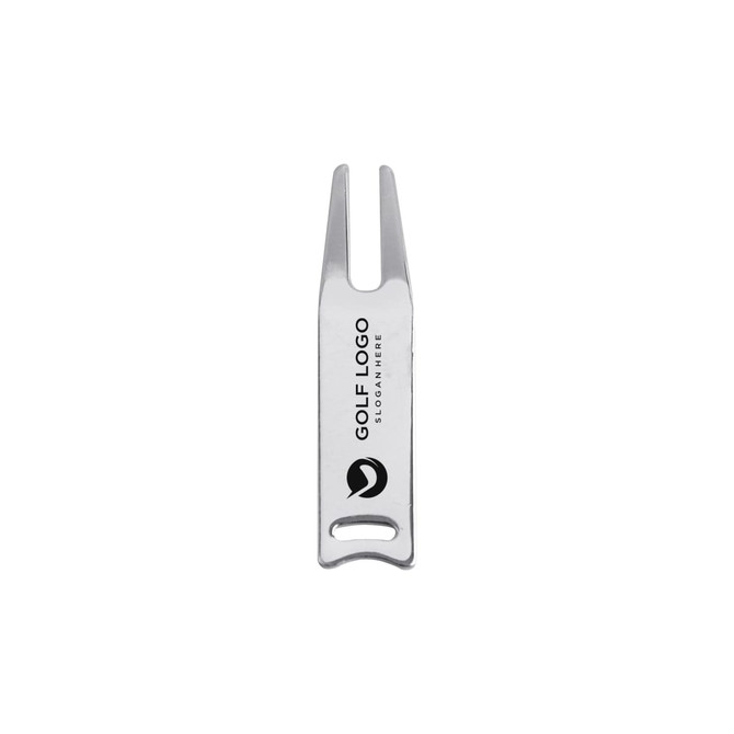 A silver golf divot tool with two prongs and a handle, featuring a logo.