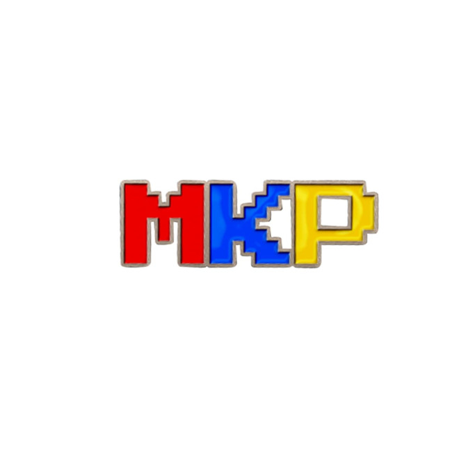 A colourful enamel pin featuring the letters "MKP" in red, blue, and yellow, outlined in silver.