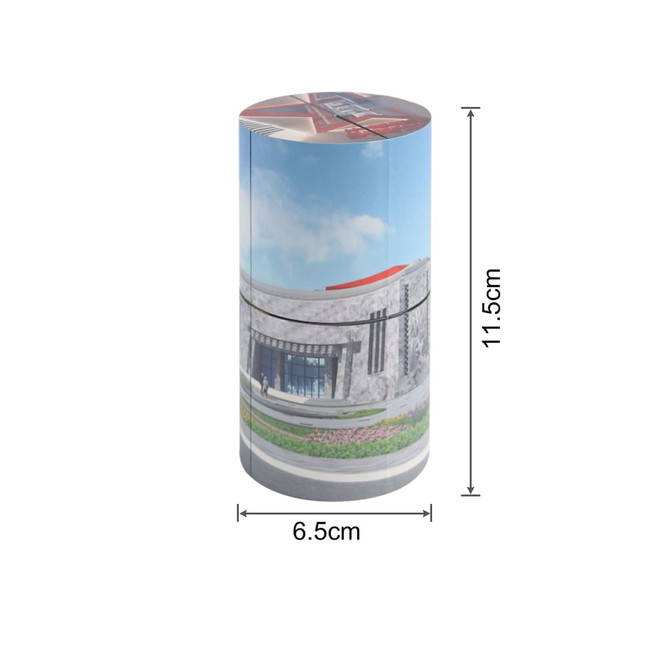 A cylindrical puzzle with a colourful design, measuring 6.5 cm by 11.5 cm, featuring a scenic architectural image.