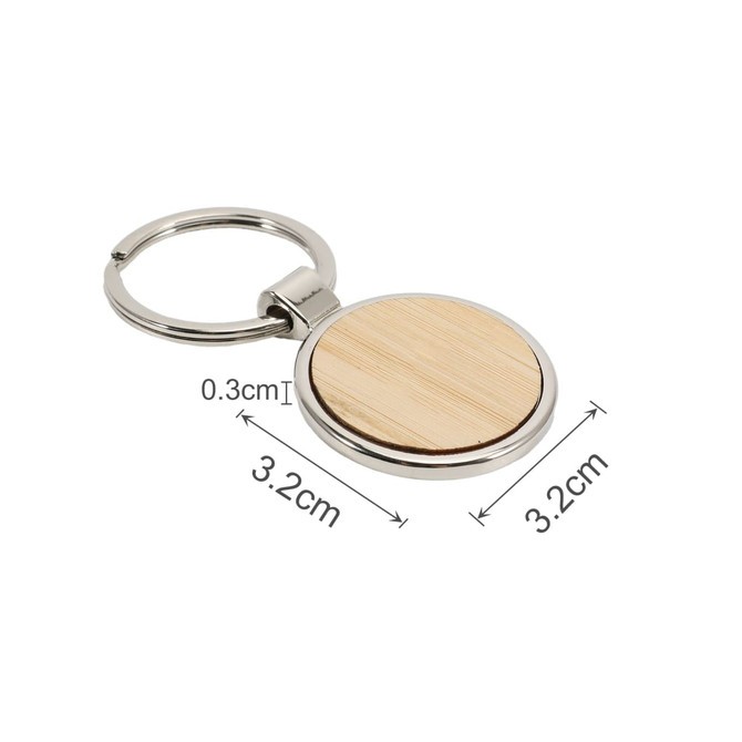 A round wooden keyring with a silver metal ring, featuring a natural wood surface. Dimensions are 3.2 cm by 0.3 cm.