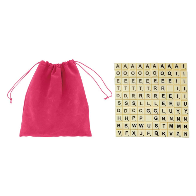 A pink drawstring bag alongside a set of beige letter tiles arranged in a grid pattern.