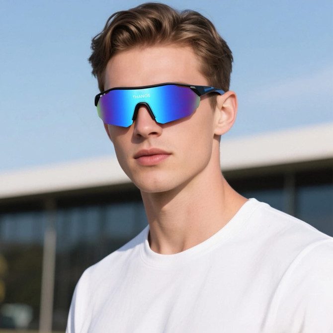 A pair of sports cycling sunglasses with mirrored lenses, set against a backdrop of a modern building.