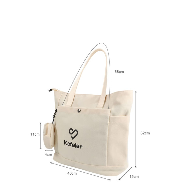 A cream casual canvas bag with two handles, a front pocket, and a small detachable pouch featuring a logo.
