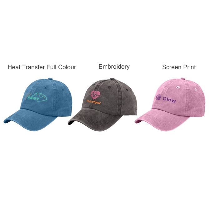A collection of three 6 panel vintage washed baseball caps in blue, grey, and pink, featuring various logos.