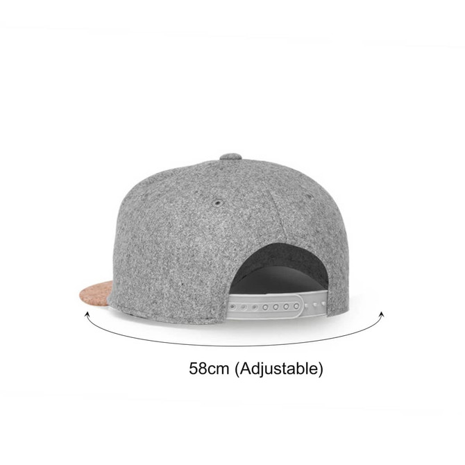 A grey flat cork snapback cap featuring an adjustable strap at the back and a cork detail on the visor.
