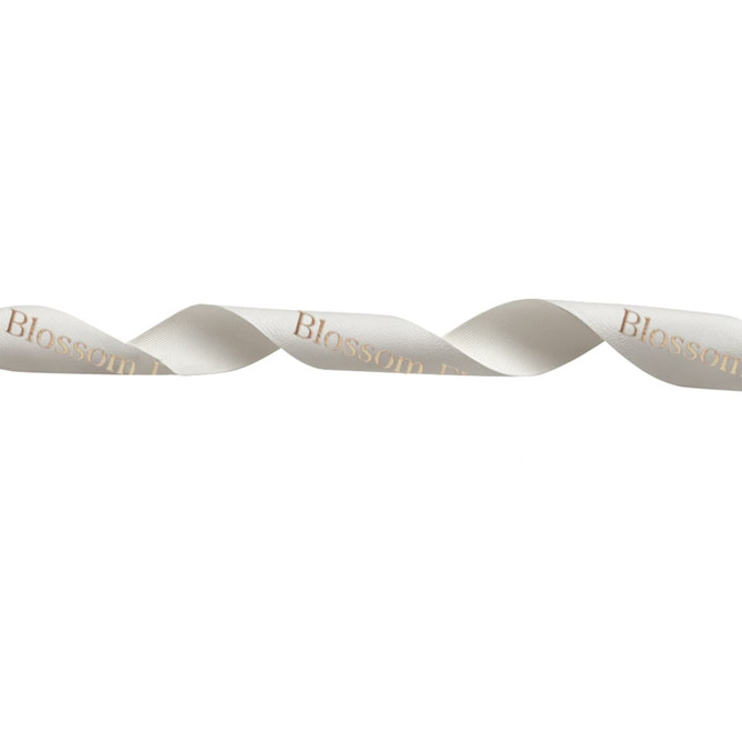 A satin polyester ribbon in white with a gold foil pattern, featuring a logo along its length.
