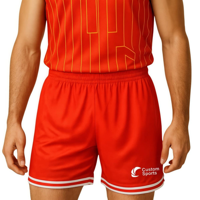 Red sport shorts made from 100% polyester, featuring a breathable design and a logo on the lower hem.