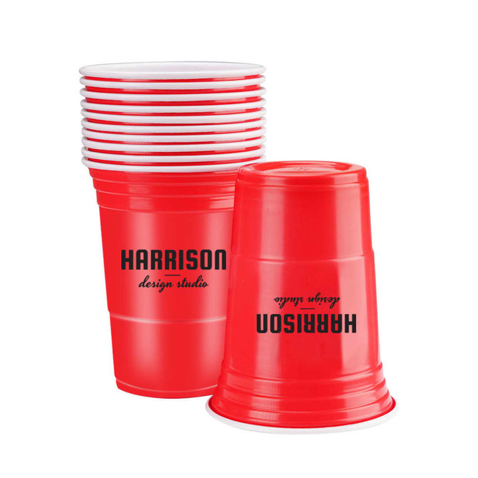 A set of red party cups stacked together, featuring a logo on some cups. Ideal for social gatherings.